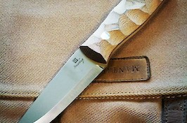 Carver model bushcrafter, in CPM S90V and brown micarta scales