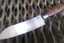Santoku kitchen knife in RWL34 and double dovetailed bolsters. This knife won the Knives UK Best in Show award 2015.